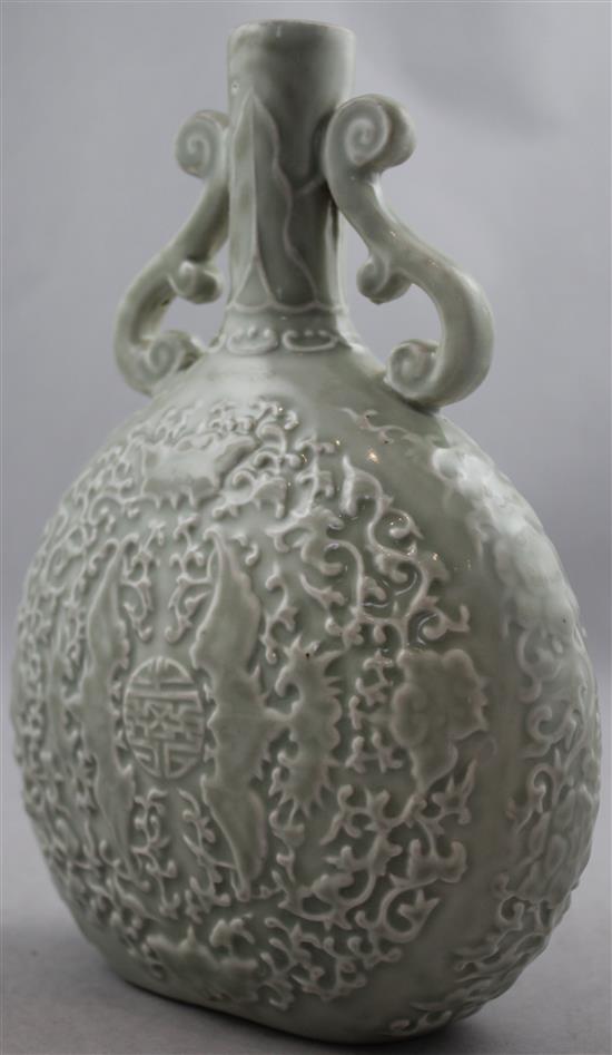 A Chinese moulded and celadon glazed moonflask, Yongzheng mark but later, 24.2cm